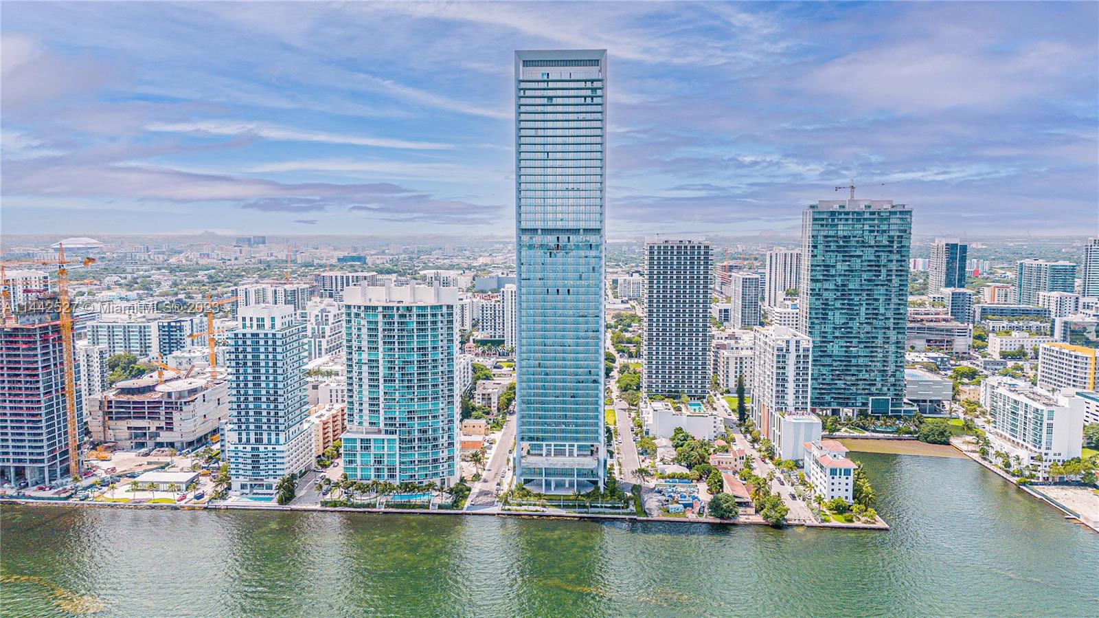 Missoni Baia redefines the essence of luxury living, catering to discerning residents with a penchant for first-class amenities and a location close to Miami's Design District, Wynwood, Midtown, and South Beach. Whether you prefer a game of tennis, a swim in the resort-style pools, movie night with friends, a chef-prepared meal in one of the shared spaces, Pilates, working out in the fitness center, delighting in the custom game room, or relishing the fresh air on your expansive terrace, Missoni is an ideal place to call home. This NE corner suite is bathed in natural light and boasts 270 degrees of mesmerizing views. With 3 ensuite bedrooms, staff quarters, and privately attached additional storage, this spacious residence is perfect for entertaining and a family-oriented lifestyle.