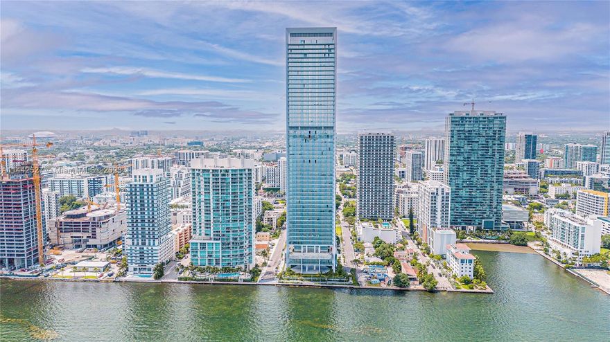 Missoni Baia redefines the essence of luxury living, catering to discerning residents with a penchant for first-class amenities and a location close to Miami's Design District, Wynwood, Midtown, and South Beach. Whether you prefer a game of tennis, a swim in the resort-style pools, movie night with friends, a chef-prepared meal in one of the shared spaces, Pilates, working out in the fitness center, delighting in the custom game room, or relishing the fresh air on your expansive terrace, Missoni is an ideal place to call home. This NE corner suite is bathed in natural light and boasts 270 degrees of mesmerizing views. With 3 ensuite bedrooms, staff quarters, and privately attached additional storage, this spacious residence is perfect for entertaining and a family-oriented lifestyle.