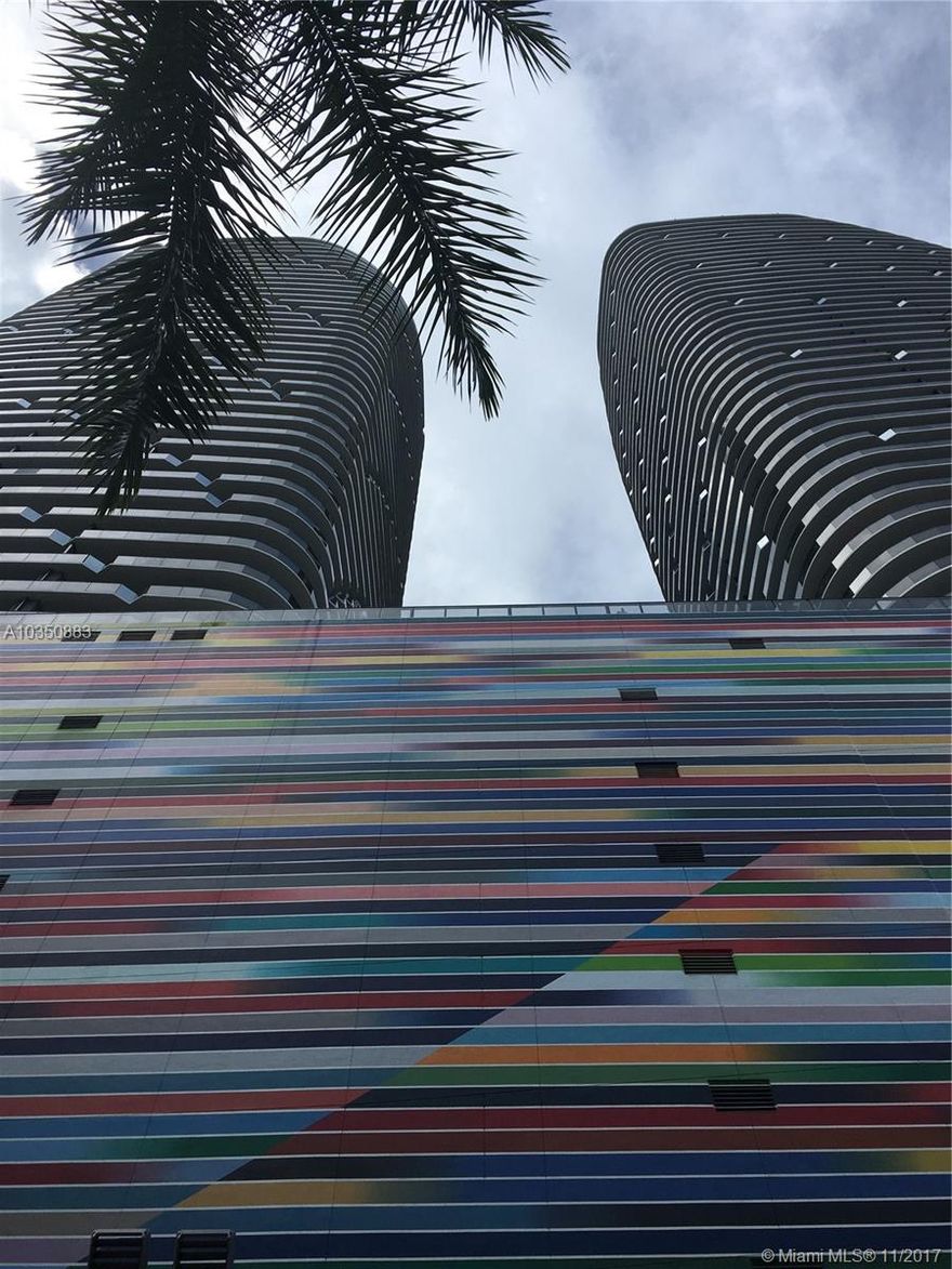 LIVE IN THIS BRAND NEW 1 BEDROOM 2 BATH W/DEN APARTMENT WITH SPECTACULAR SOUTHERN VIEW OF BAY AND BRICKELL AREA.ITALIAN LIGHT WOOD PLANK CERAMIC FLOORS, QUARTZ COUNTERTOPS IN KITCHEN AND BATHS, TOP OF THE LINE GE MONOGRAM APPLIANCES,  STACKED WASHER AND DRYER, WATER, CABLE AND INTERNET INCLUDED PLUS 1 YEAR FREE MEMBERSHIP TO EQUINOX.
1 FREE VALET PARKING....AMENITIES INCLUDE GYM, JACUZZI-SAUNA, SPACIOUS PARTY AND ENTERTAINMENT ROOMS WITH POOL TABLE, PING PONG AND TV.... THEATER ROOM, A ROOFTOP POOL AND SECOND WALK-IN EXPANSIVE WATERFALL POOL ON 9TH FLOOR.CONVENIENTLY LOCATED ACROSS THE STREET FROM MARY BRICKELL VILLAGE, PUBLIX SUPERMARKET AND AREA RESTAURANTS....JUST SHORT WALK TO BRICKELL CITY CENTRE AND BRICKELL AVENUE.
