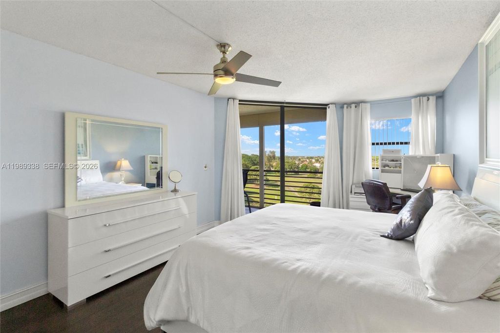 Photo of 7400 Radice Ct #702, Lauderhill, FL 33319 (MLS # A11989338)