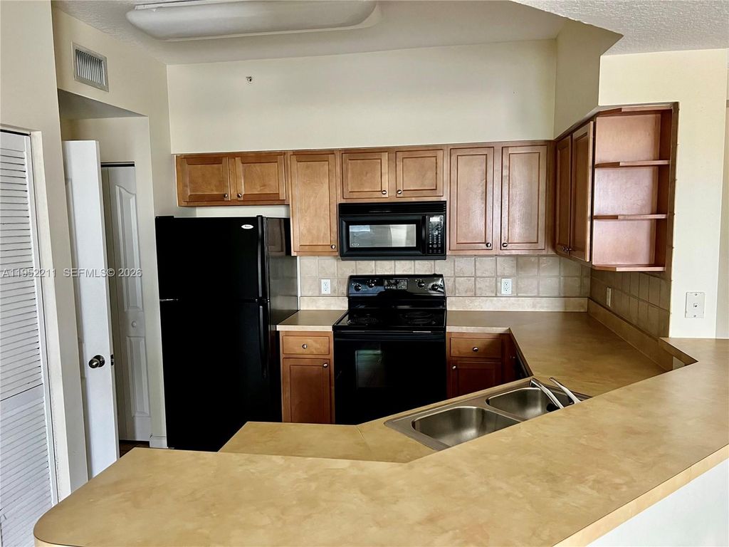Photo of 9873 Baywinds Dr #5208, West Palm Beach, FL 33411 (MLS # A11952211)