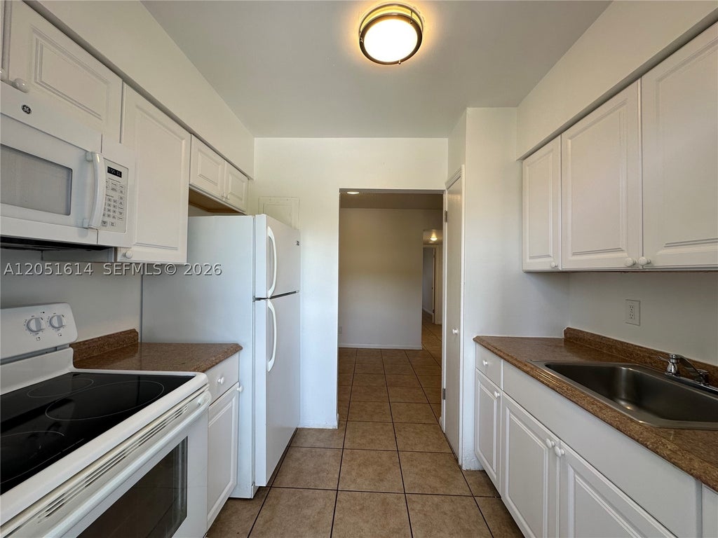 Photo of 1400 NE 56th St #306, Fort Lauderdale, FL 33334 (MLS # A12051614)