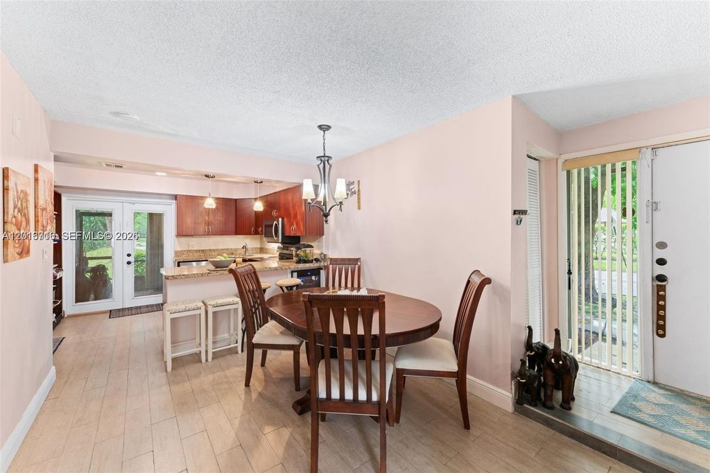 Photo of 64 Wimbledon Lake Dr #64, Plantation, FL 33324 (MLS # A12016716)