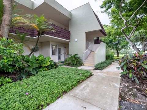 Photo of 3201 N Course Ln #209, Pompano Beach, FL 33069 (MLS # A11880712)