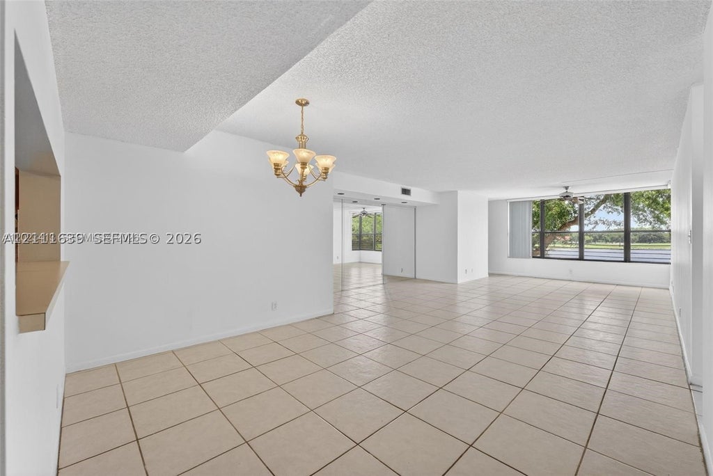 Photo of 2768 S Carambola Cir S #206, Coconut Creek, FL 33066 (MLS # A12111639)