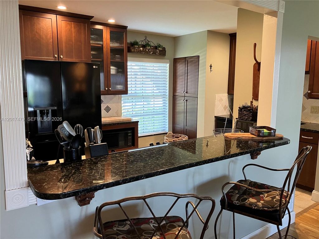 Photo of 18349 SE Wood Haven Ln #A, Jupiter, FL 33469 (MLS # A12017479)