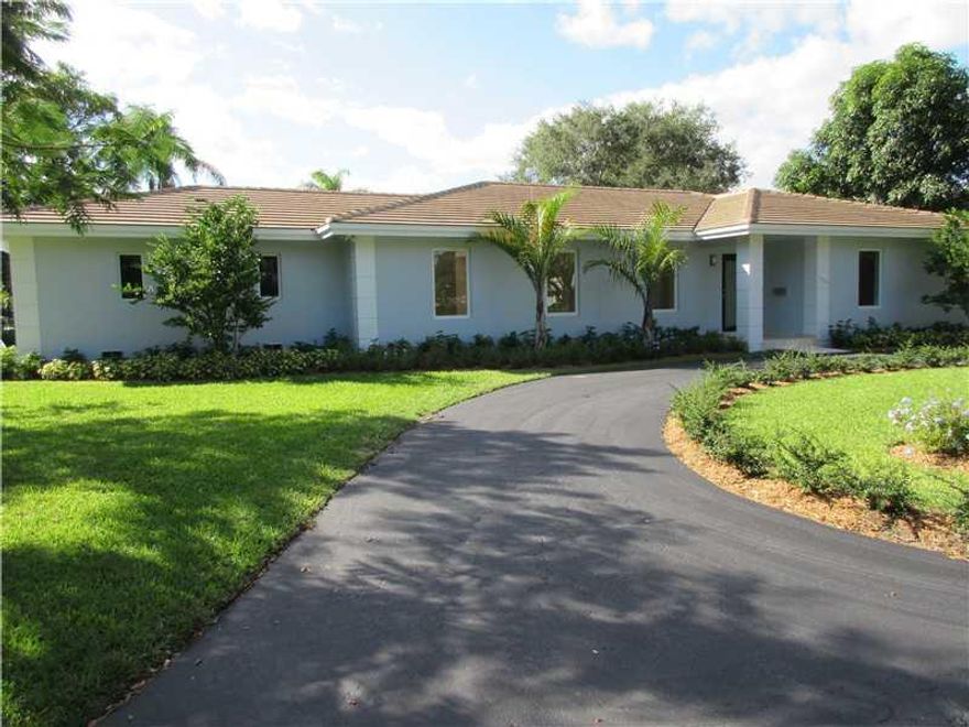 Completely updated 4Br/3Ba pool home with fabulous park location behind Coral Reef Park on a quiet, no-traffic street. All new impact windows & doors, plumbing, electric, AC units, marble floors, alarm system, built-in closets, molding galore, indoor laun dry, and 1 year old tile roof. New custom kitchen with quartz countertops & SS appliances. Marble bathrooms. Fabulous master suite w/double sinks and walk-in closet. Stunning house in the best location!