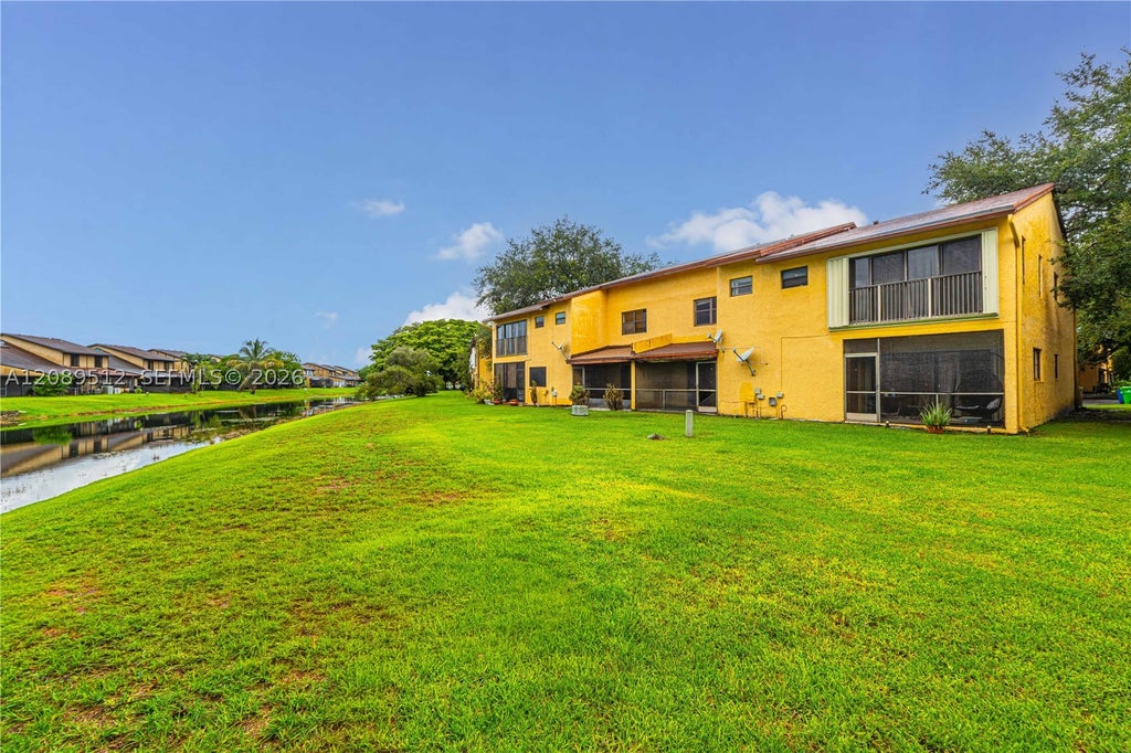 Photo of 9014 NW 45th Ct, Sunrise, FL 33351 (MLS # A12089512)