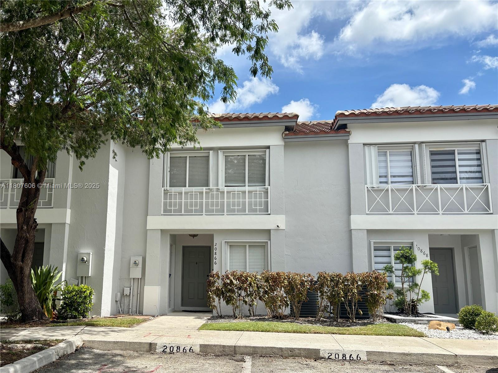 Gorgeous cul-de-sac townhouse in gated Malibu Bay! Step inside to upgrades galore! *Kitchen features white wood shaker cabinetry w/stone counters & tons of storage *All bedrooms upstairs *New tastefully remodeled bathrooms *Master suite features vaulted ceilings, a roman tub, & large walk-in closet *Impact sliding doors lead to the spacious covered screened patio w/ views to a large open green space - like having a backyard that you don't have to maintain! *Accordion shutters *New roof 2025 *HOA in process of painting and remodeling amenities! Assessments already paid in full! HOA fee includes fiber internet/cable, gated community, landscaping, pool, gym, tennis, etc. All schools A-rated!