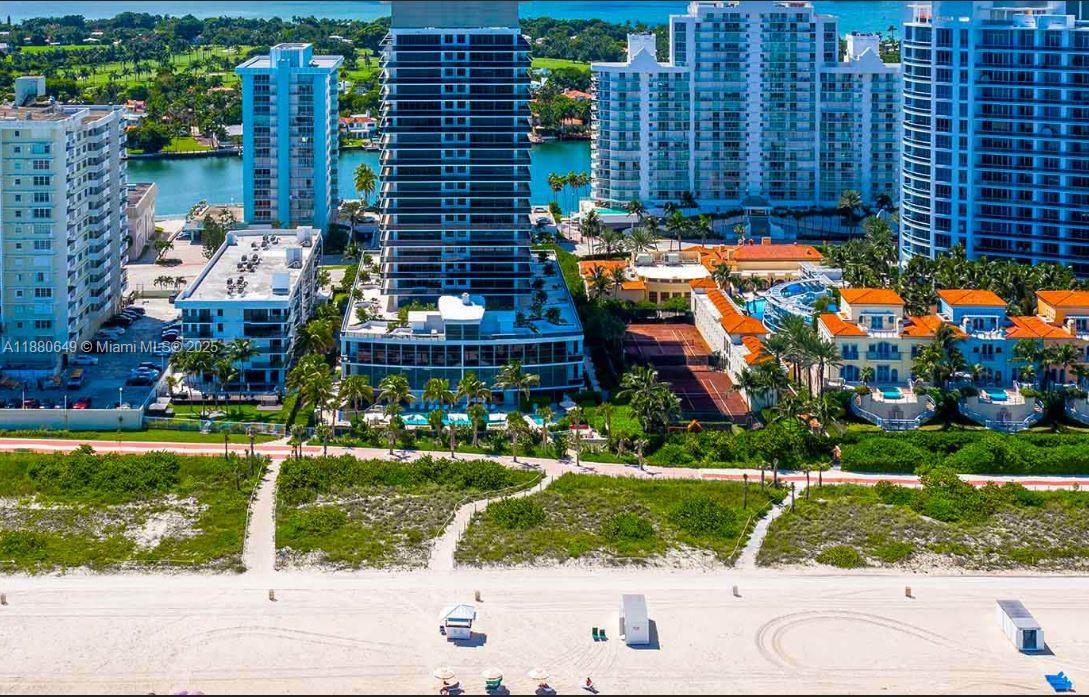 Come and enjoy the beachfront lifestyle in this fully equipped condo. The MEI building is world renown for its amenities including the pool, spa, steam room, sauna, dedicated masseuse available and beachfront access. This corner unit is a gem, situated with both excellent city views and ocean views. The layout is very inviting for all of your family and guests. High-end, luxury furniture including beds, glass tables and a couch are included in the sale if the buyer is interested. Act now, because this unit will not last.
