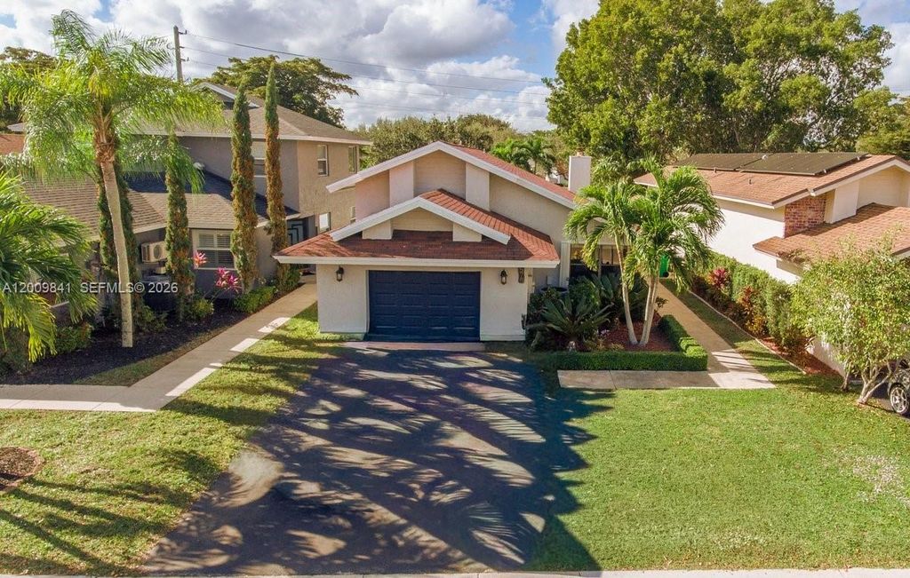 Photo of 575 Lakeside Cir, Sunrise, FL 33326 (MLS # A12009841)