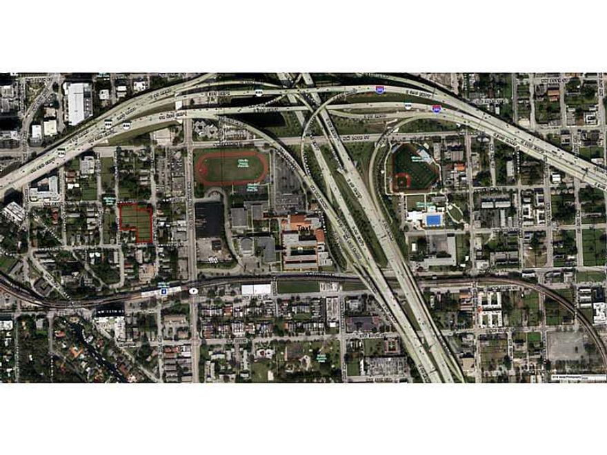 Vacant land strategically located on the SE corner of NW 13th St and NW 8th Ave in Miami-Dade County between the booming Miami River area, the University of Miami Medical Center & Jackson Memorial Hospital. Close proximity to Athalie Range Park, Booker T  Washington Senior High School, Metro Rail station and the "Miami Partnership" economic redevelopment area. The property is comprised of 11 contiguous Folios totaling 59,391 SF (1.36 acres). Zoning on this site is T6-8-L. Qualifies for Tax Credit.