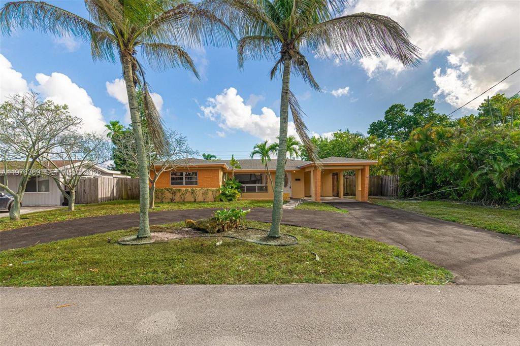 Photo of 1600 NE 63rd Ct, Fort Lauderdale, FL 33334 (MLS # A11976389)