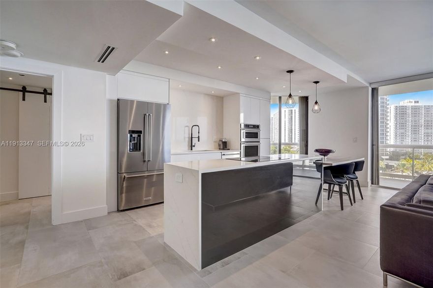 Spectacular Fully Remodeled 2-Bedroom, 2-Bath Condo with Panoramic Water, Golf & City Views: Seller Pays Special Assessment!

Welcome to the finest 2/2 residence in the building. This stunningly remodeled condo delivers luxury living at its best, showcasing sweeping views of shimmering water, lush golf greens, and the vibrant city skyline. Bathed in natural light, the open-concept layout is enhanced by premium finishes and thoughtful design throughout.

The chef-inspired kitchen is a true showpiece, featuring top-of-the-line appliances, custom cabinetry, and sleek surfaces; perfect for both everyday living and entertaining. Expansive living and dining areas flow effortlessly, creating a refined yet inviting atmosphere.

Retreat to spacious bedrooms offering custom closets and spa-inspired bathrooms designed for comfort and relaxation. Every detail has been meticulously curated to blend modern elegance, functionality, and timeless style.

Unwind with breathtaking sunsets and sparkling city lights from your private sanctuary. Ideally located near houses of worship, upscale shopping, and A-rated schools, this move-in-ready home is an exceptional opportunity to enjoy luxury, location, and value—all in one remarkable residence.