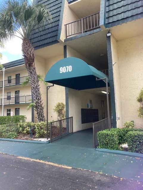 Photo of 9070 Lime Bay Blvd #108, Tamarac, FL 33321 (MLS # A11909930)