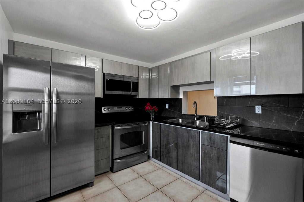 Photo of 431 SE 3rd St #402, Dania Beach, FL 33004 (MLS # A12039164)