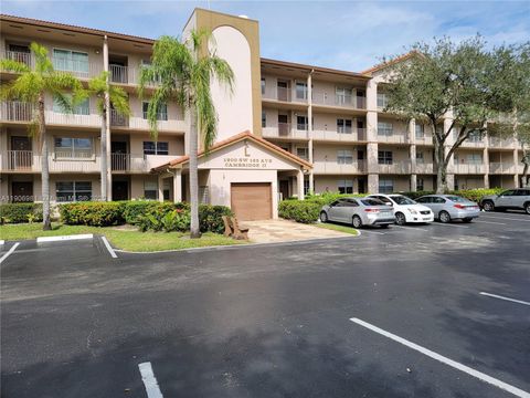 Photo of 1200 SW 125th Ave #211L, Pembroke Pines, FL 33027 (MLS # A11906981)