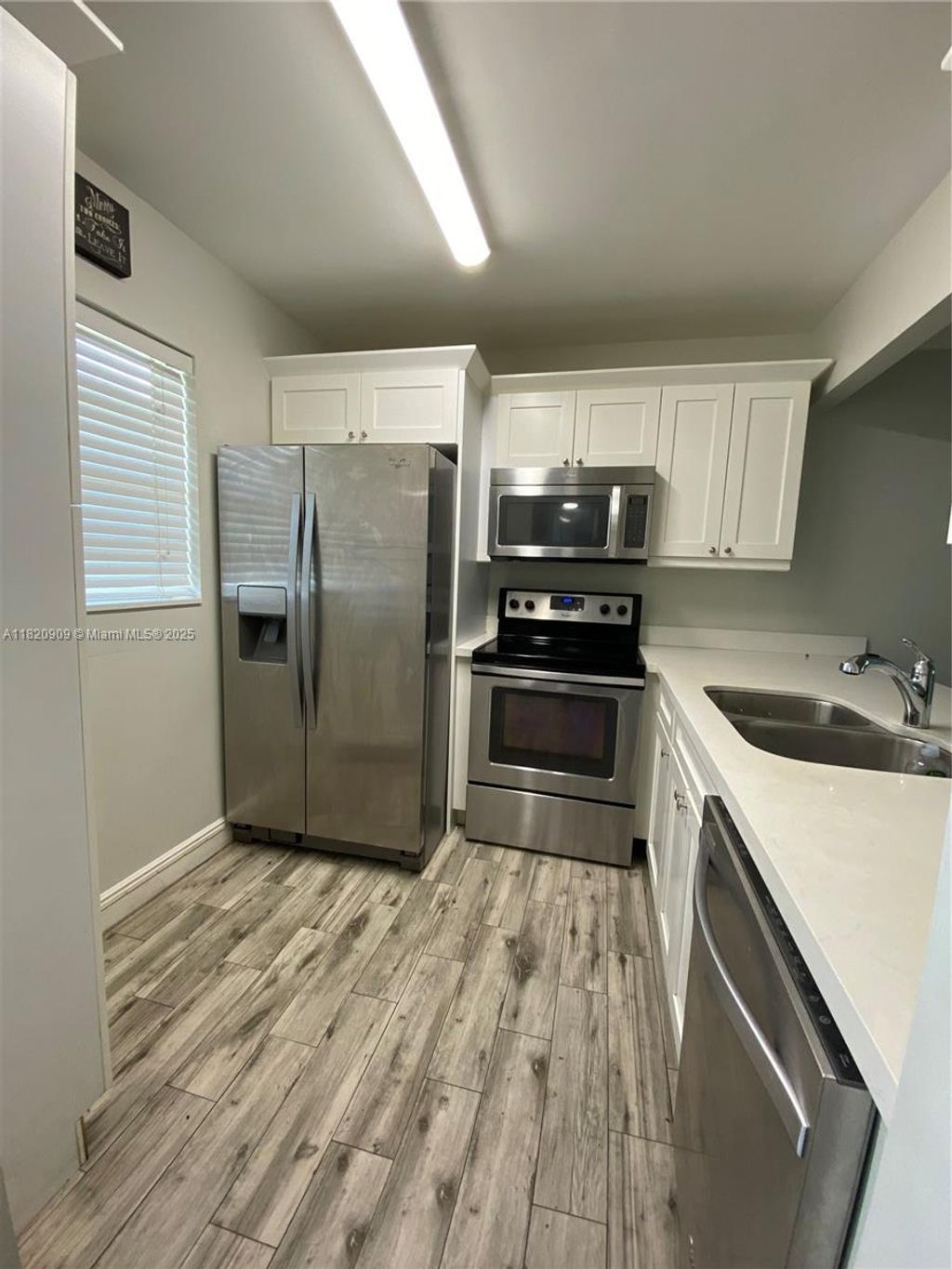 Photo of 5181 W Oakland Park Blvd #112, Lauderdale Lakes, FL 33313 (MLS # A11820909)