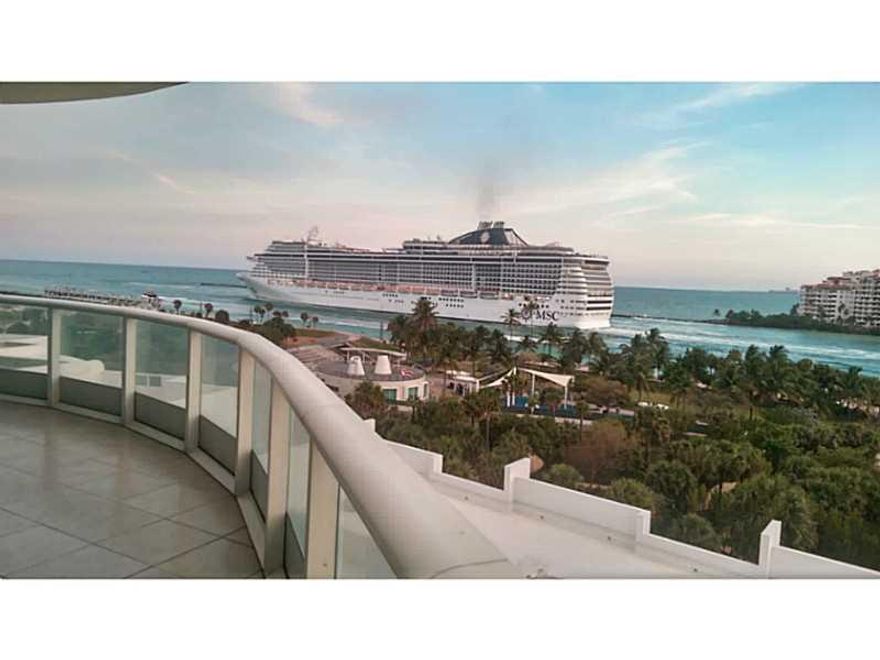 HAVE A SLICE OF THE VERY TIP OF SOUTH BEACH  . . .  FROM FLOOR TO CEILING THE GLITTERING OCEAN & DEEP BLUE SKY SHINE BRIGHTLY   . . .   MULTIFACETED '04 LINE VIEW OF OCEAN, SOUTH POINTE PARK, FISHER ISLE, PORT, DOWNTOWN SKYLINE  . . .  CONTEMPORARY ITALIAN KITCHEN    . . .  MARBLE LIVING AREAS   . . .   MAKE THIS PARIDISE YOUR NEW HOME