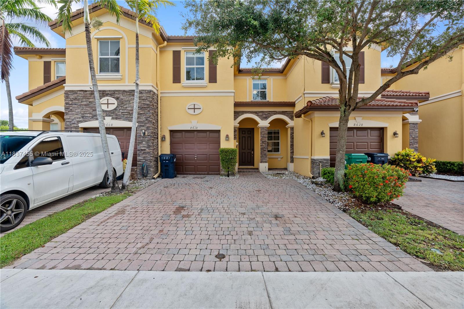 8618 NW 113th Ct .