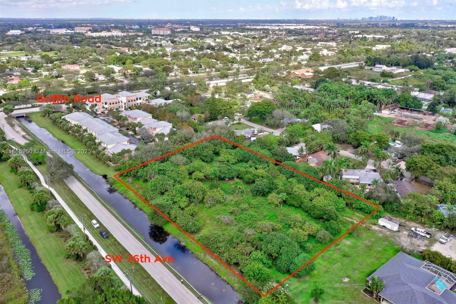 Seize the opportunity to develop on this prime 2.24-acre residential lot in Davie, Florida. Located on SW 76th Avenue near Griffin Road, this property is zoned A-1, allowing for the immediate construction of two homes (one per acre). Alternatively, explore future growth by applying for R5 zoning.
Adjacent to Spykes Grove, a new D.R. Horton development, this land benefits from a vibrant community setting. The sale also includes an additional 0.75 acres of canal frontage, enhancing the property's appeal. Build in a booming area and secure your place in this dynamic neighborhood.