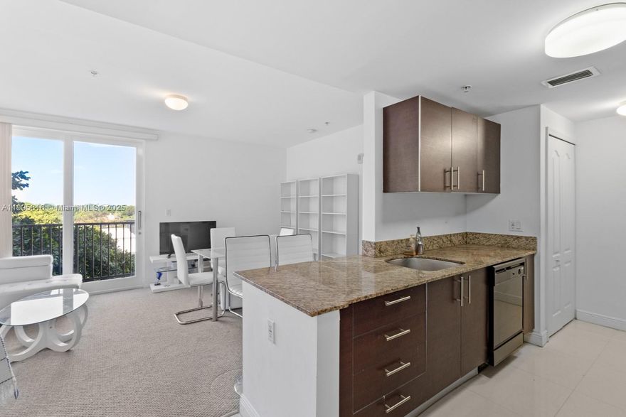 Amazing 1 Bed / 1.5 Bath at the Roads. Prime location, just minutes away from Brickell, Downton Miami, Key Biscayne and Coconut Grove. Beautiful boutique building built in 2009. Granite counter tops, marble floors and carpeting. Excellent move-in condition. Covered indoor parking. Also no metered street parking. Amenities include outdoor pool, gym and recreation room.