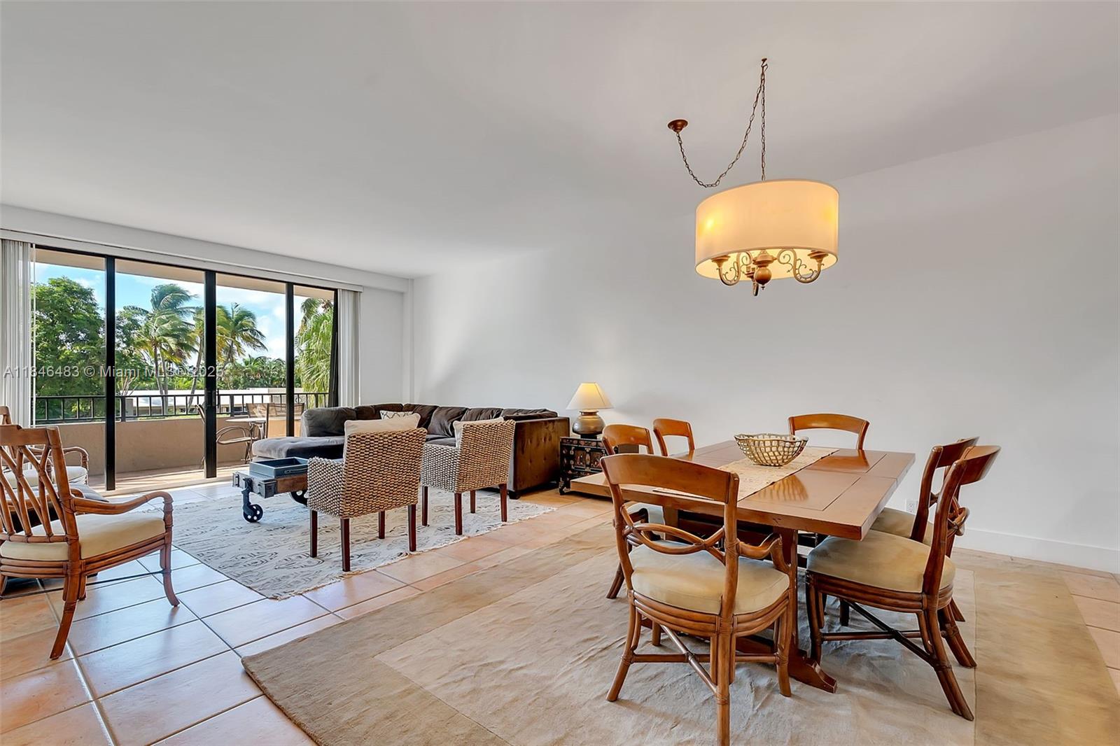 Experience island living in this bright, spacious home with two bedrooms, two bathrooms, and a versatile den ideal for an office or guest retreat. The primary suite features generous closet space, while true hardwood in the bedrooms and porcelain tile in the living areas add elegance. A large balcony offers wide views of the pool, jacuzzi, and lush gardens—perfect for sunrise coffee or sunset cocktails. Resort-style amenities include umbrella beach service, a beachfront restaurant, 12 tennis courts, multiple pools (including a lap pool), a fitness center, salon, and spa. Assigned parking (C-10) and 24-hour security complete this island oasis. Schedule your private showing today.