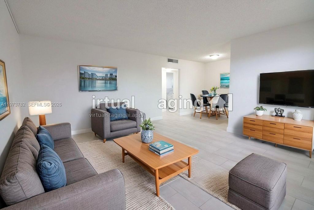 Photo of 400 NE 1st St #207, Hallandale Beach, FL 33009 (MLS # A11973782)