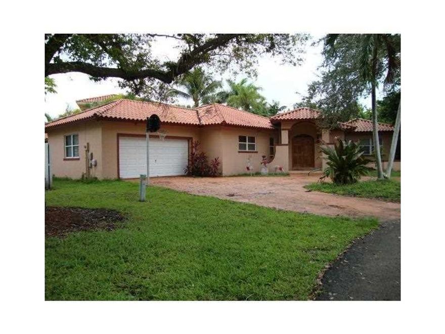 Spectacular 4 bedrooms, 3 baths w/ drastically reduced price. Pool home in a quiet cul-de-sac. Foyer entrance, Tile thru-out, remodeled kitchen quality cabinets, center cooking island & stainless steel appliances, family room, security camera system, spacious bedrooms & beautiful patio overlooking a triangle pool & landscaped fenced backyard! ENJOY LIVING IN PARADISE IN THE HEART OF KENDALL!! Centrally located in quiet neighborhood near shopping centers, restaurants & major highways. Bring offers!!