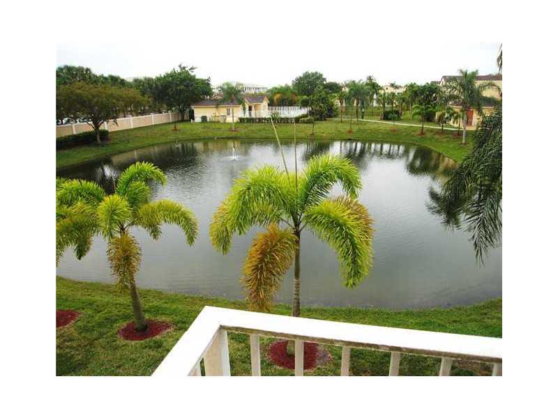 BEAUTIFUL 2/2 1/2 TOWNHOUSE ALL REMODELED. WITH TILE FLOOR, LAKE VIEW, OPEN BALCONY, WASHER AND DRYER IN UNIT.CENTRAL LOCATION.