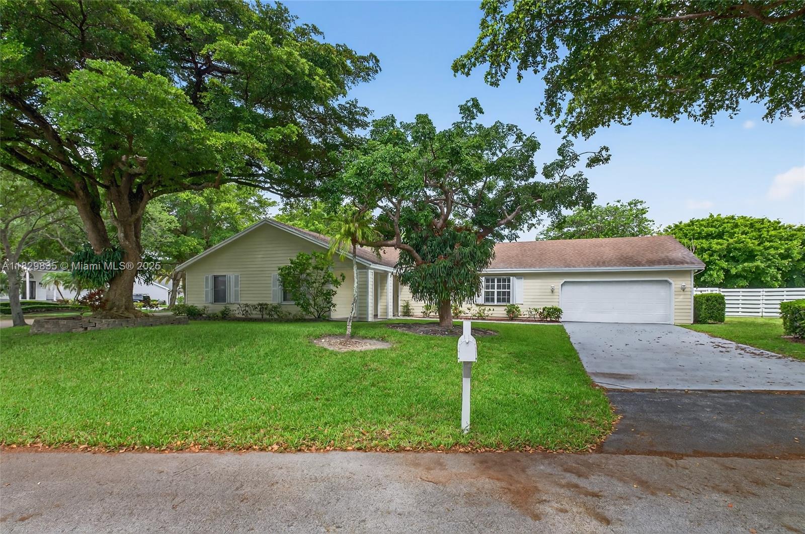 You will find this terrific Country Walk Estate home on the corner of a beautiful, lushly landscaped cul-de-sac. 4 bd, 2 ba, large primary with huge closet,double sinks and separate shower. Very neutral waterproof laminate with vinyl backing in all bedrooms plus living rm. Tiled family room/lkitch. New kitchen, new AC and flooring in 23/24. Open kitch with lots of wooden cabinets, spacious island, pantry and organizers, corian counters. All stainless steel appl. Separate laundry room. 2 car garage.Exterior with Hardy boards. Large driveway. Back yard with Avocado tree and 5 banana trees.Close to elem school and a great Country Walk Community Center, tennis, sparkling pool, clubhouse, play area, and so much more. Roving patrol.Separate laundry rm large driveway. New water heater 2017.