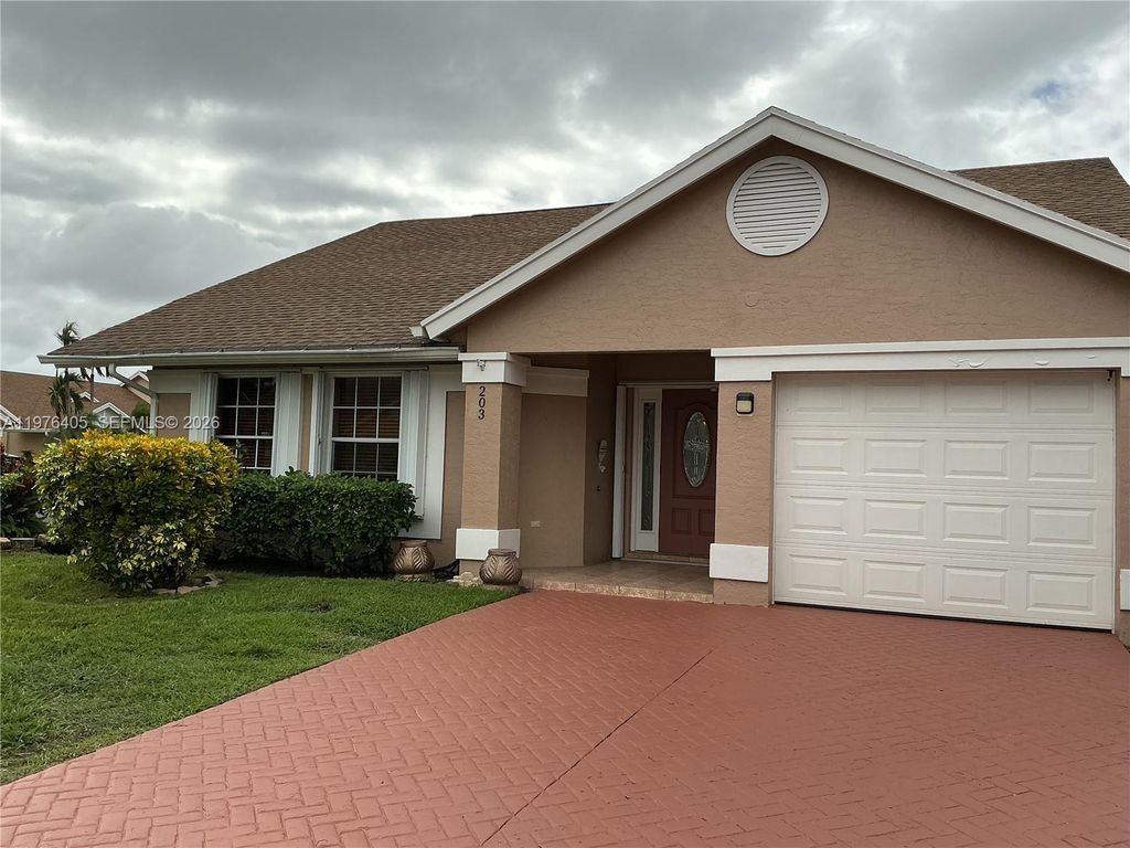 Photo of 203 N Moccasin Trl N, Jupiter, FL 33458 (MLS # A11976405)