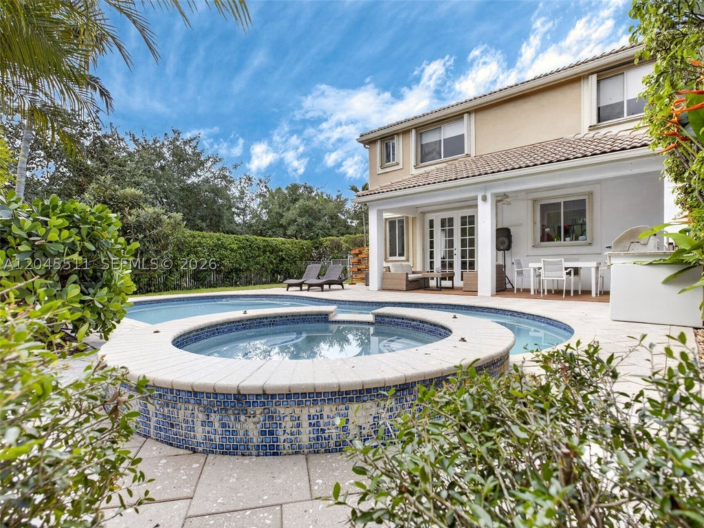 Photo of 1401 Canary Island Dr, Weston, FL 33327 (MLS # A12045511)