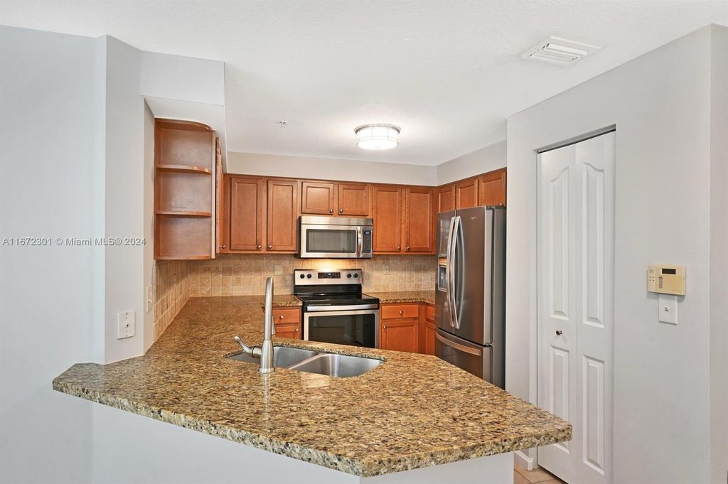 Photo of 155 Galicia Way #211, Jupiter, FL 33458 (MLS # A11672301)