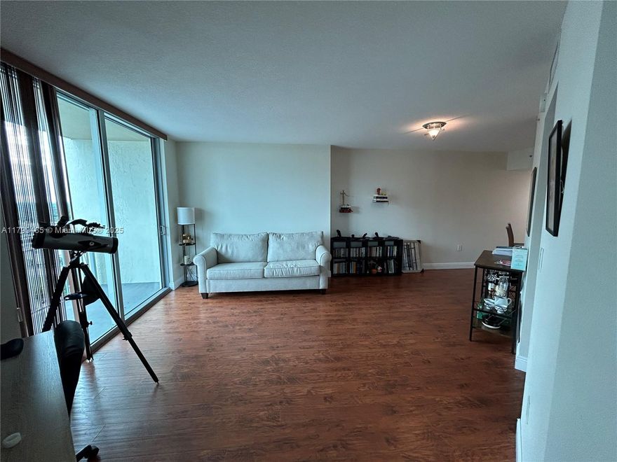 Absolutely lovely unit with unobstructed views stretching over Pinecrest to Biscayne Bay! Light-filled open master with walk-in closet. Bright European kitchen with solid wood cabinets, granite counters, and stainless steel appliances. Includes 1 assigned space + complimentary valet for 2nd car. Prime location—steps to Dadeland Mall, Metrorail, dining, and Publix, with quick access to US-1 & Palmetto. Full amenities: gym, 2 pools, concierge, security, free cable, internet, water, and garbage. Price is negotiable to offset upcoming special assessments—opportunity to buy smart.