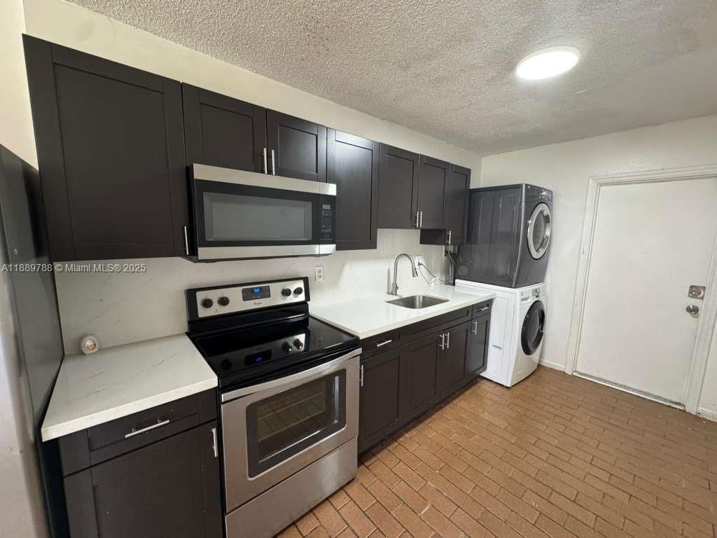 Photo of 2710 NW 11th Pl #1-2, Fort Lauderdale, FL 33311 (MLS # A11889788)