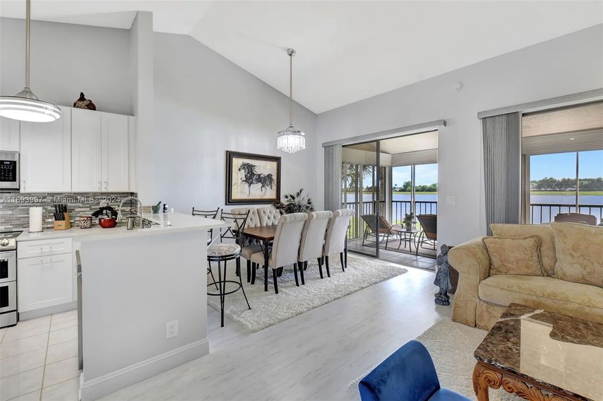 Enjoy this lovely and peaceful 55-plus lakefront unit in the gated community of Gardens of Sweetwater. The 2/2 unit has a huge 1,679-square-foot floor plan and an open-concept kitchen with a lake view. The new kitchen has modern SS appliances, quartz countertops, a pantry, and plenty of new cabinets. The remodeled bathrooms have new cabinets and glass sliding doors. The A/C and water heater are 2021. The unit is hurricane-protected, with impact windows and a shutter on the balcony. There are 6 modern fans and a laundry room. The unit is being sold partially furnished; please check the attachments.  The HOA offers pickleball, basketball, tennis courts, a swimming pool, and a gym.