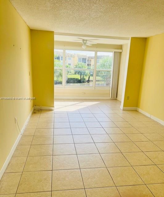 A MUST SEE! This Remodeled Two Bedroom Condominium in Sunrise Lakes PH 2 is gorgeous. The unit is on the second-floor steps away from the elevator, shared laundry, and an additional storage unit. Once inside the unit, you will become emersed in the full water views from the large living room windows. The kitchen is equipped with real wood cabinets, recessed lighting, and garbage disposal. The bedroom has a large walk-in closet and another view of the gorgeous lake behind the unit.