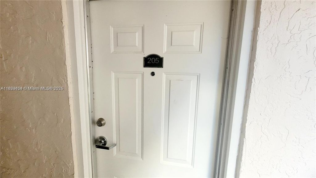 Photo of 10105 W Sunrise Blvd #205, Plantation, FL 33322 (MLS # A11823424)
