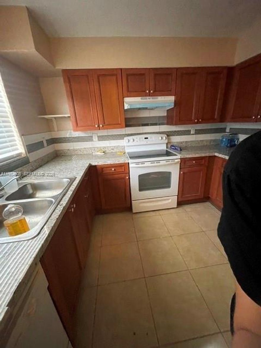 Spacious 2-story townhome in Miami, minutes from Hard Rock Stadium, Hollywood Beach, Downtown, and South Beach. Newly renovated with porcelain and vinyl floors, upgraded kitchen with granite counters, and a master suite with walk-in closet and private bath. Balconies front and back, central A/C, and plenty of storage.