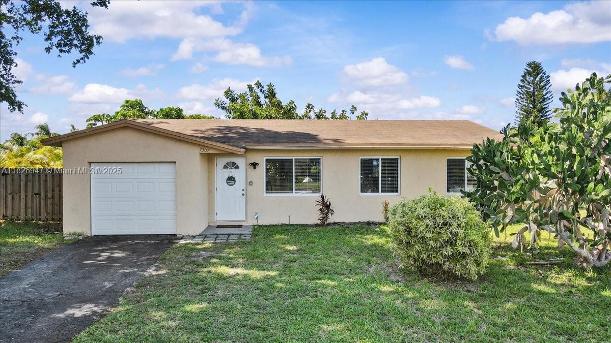 Welcome to 7307 SW 8th St—this beautifully maintained 3-bedroom, 2-bath single-family home offers comfort and charm in a quiet North Lauderdale neighborhood. Enjoy serene canal water views from your spacious screened-in patio, perfect for relaxing or entertaining. Inside, you'll find an upgraded kitchen and modern bathrooms, creating a stylish and functional living space. The home also features a newer roof (2019) for added peace of mind. Whether you're a first-time buyer or downsizing, this home checks all the boxes. Don’t miss out!