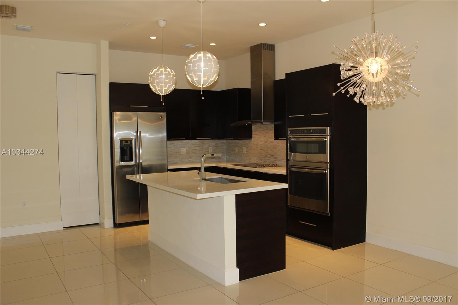 YOU WILL LOVE THIS NEWER, BEAUTIFUL AND CONTEMPORARY CONDO IN THE NEW DEVELOPMENT OF LANDMARK!! THIS GROUND LEVEL 3 BED/2BATH UNIT HAS AN OPEN FLOOR PLAN, IMPACT RESISTANT WINDOWS, STAINLESS-STEEL APPLIANCES, WHITE QUARTZ COUNTERTOPS, AN UNDER-COUNTER WINE COOLER, UPGRADED MASTER CLOSET BUILT-INS, MODERN BLINDS, STYLISH LIGHTING FIXTURES, AND PROGRAMMABLE KEYLESS LOCK. UPCOMING LUXURIOUS AMENITIES SUCH AS OPEN AIR AMPHITHEATRE, GRAND POOL, SPA, WATER PARK AND MUCH MORE!! MINUTES FROM THE DOLPHIN MALL AND THE NEW CHARTER SCHOOL , "DORAL INTERNATIONAL ACADEMY OF MATH & SCIENCE".