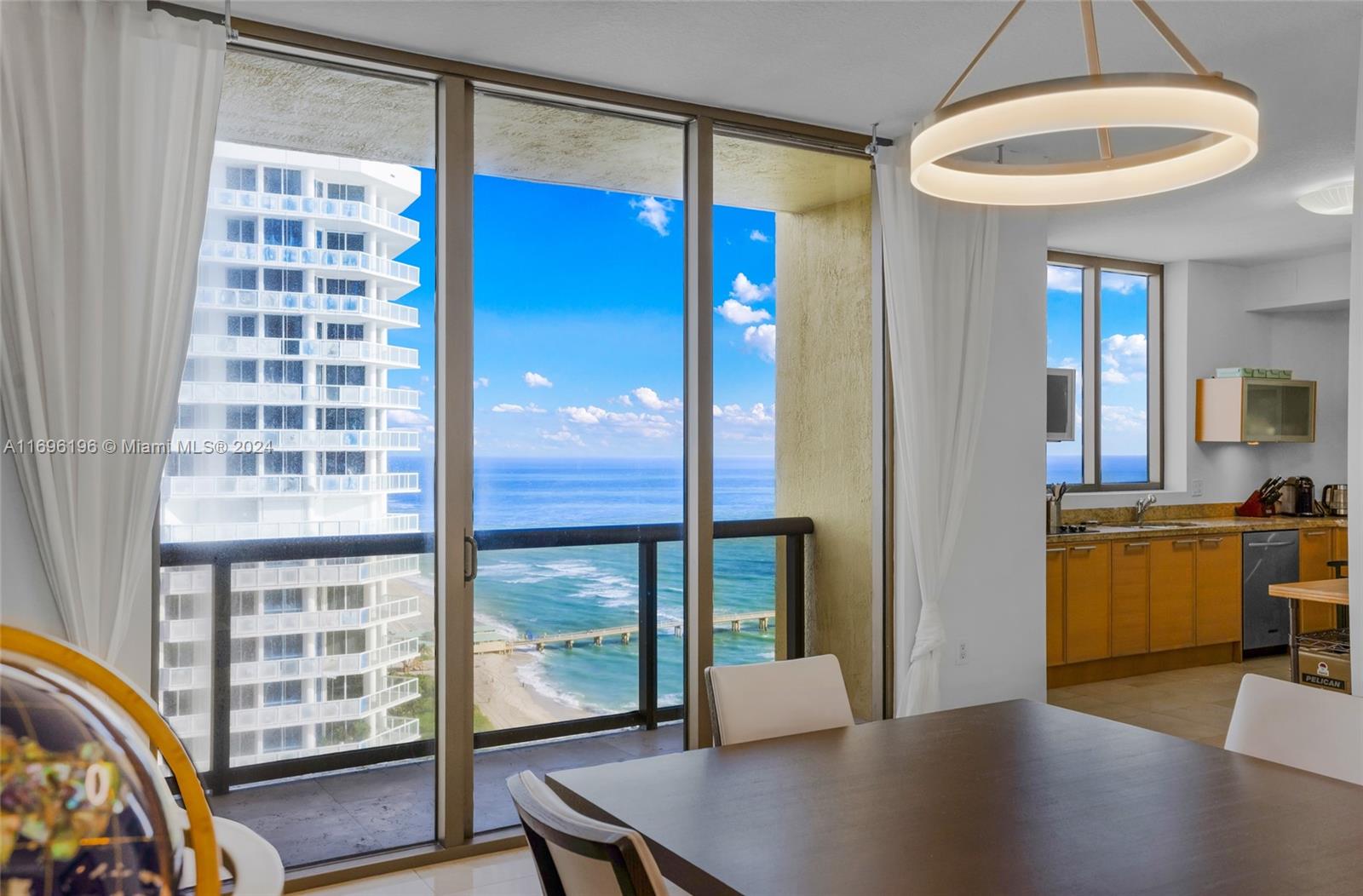 Sayan is a stunning luxury condominium located in the prestigious Sunny Isles Beach, offering a perfect blend of modern elegance and exceptional comfort. Rising 28 stories above the Atlantic Ocean, this iconic building is renowned for its striking architectural design and unparalleled oceanfront views.
Residents enjoy top-tier amenities, including a state-of-the-art fitness center, an oceanfront pool with cabanas, a spa, and a private beach club. The Sayan building offers not just a home, but a lifestyle—one of elegance, privacy, and sophistication. With its prime location in the heart of Sunny Isles, Sayan provides easy access to fine dining, shopping, and entertainment, making it the ideal choice for those seeking an exclusive and serene coastal living experience.