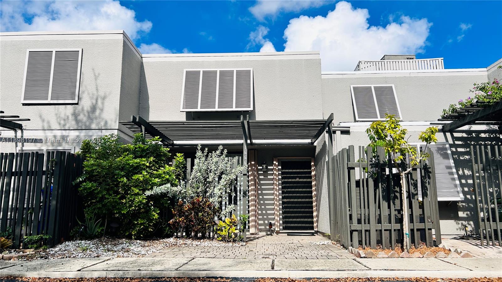 Beautiful 2-bedroom, 1.5-bath townhouse in the desirable Villas Lakes community of Pembroke Pines. Enjoy relaxing lake views, bright open living areas, and a private fenced patio perfect for entertaining. Features an updated kitchen with stainless steel appliances and plenty of storage. Community amenities include a pool, tennis courts, squash/racquetball courts, playground, and walking paths surrounded by lush landscaping. Excellent location near shopping, dining, highways, and top-rated schools. A perfect place to call home!