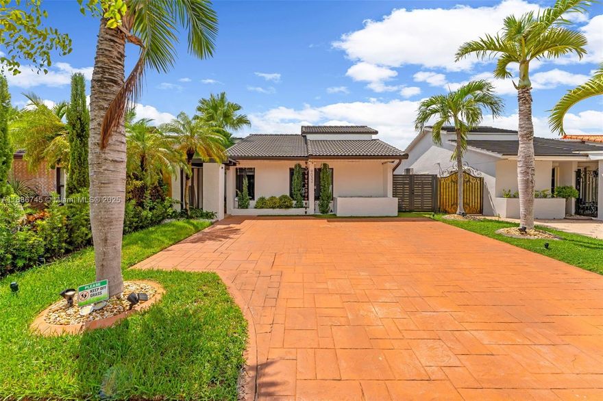 Agent-owned home in the heart of Westchester—updated and move-in ready. Tile roof (2017), impact windows/doors (2018), wood kitchen (2018) with quartz tops, backsplash and stainless-steel appliances. Renovated bathrooms, new laminate flooring (2025), and fresh interior/exterior paint (2025). New AC (2019), Titan water heater, custom Elfa closets. Kitchen water filtration system and EV charging station. Spacious driveway fits up to 6 cars and a large patio ideal for gatherings under the Miami sun. Central location near Coral Way with easy access to shopping, dining, major roads, and highly rated public and private schools.