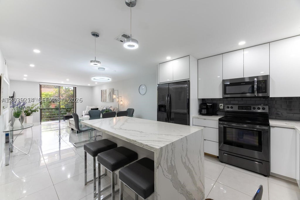 Photo of 3351 NW 85th Ave #218, Coral Springs, FL 33065 (MLS # A12039214)