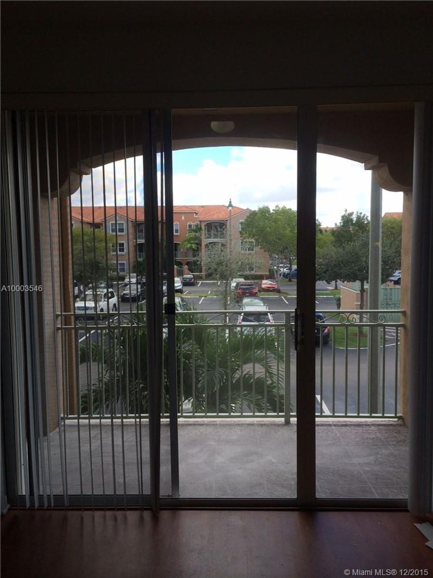 Beautiful 2nd floor 2B/2B condo at The Courts in Doral, west of Miami Int'l Airport.  Wood floor in living areas and bedrooms.  Just remodel kitchen with granite counter tops and new appliances. Washer and dryer in unit. Gated community in Doral close to shops, schools, parks. Easy to show