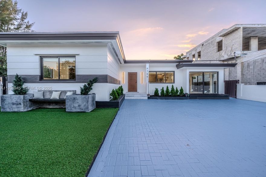 Fully renovated 3BD/3BA home with top-of-the-line finishes throughout. Features a brand-new oversized pool, private courtyard driveway, new pergola, impact windows and doors, new roof, new A/C, and new pool equipment. Renovated from top to bottom. Prime location one block from Mount Sinai Hospital, minutes to the beach, and quick access to the I-195 bridge. Top-rated schools. Offered under $2M, it is surely the best deal in the area!