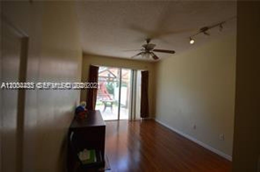 Photo of 15590 NW 12th Ct, Pembroke Pines, FL 33028 (MLS # A12004433)