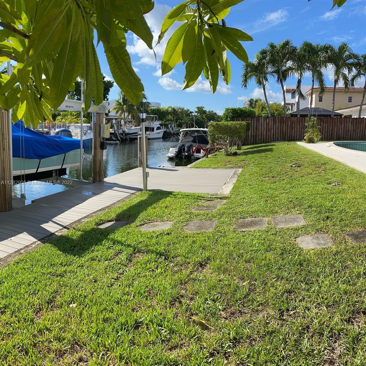 Great opportunity to own your property on the water with direct access to Biscayne Bay in Keystone Point, North Miami.  Large home and lot offers 3 bedrooms, den, 3 full baths and, a true two car garage all just under 3000 sq ft sitting on a 11,200 sq foot lot.  Owner just installed a new a/c and impact windows as well as a new dock with boat lift.  Must See!